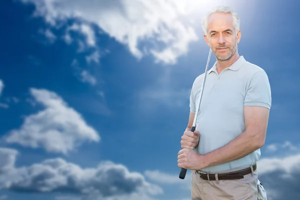 Man holding golf club — Stock Photo, Image