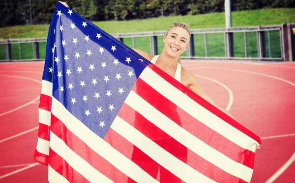 Sportovec hospodářství americká vlajka — Stock fotografie