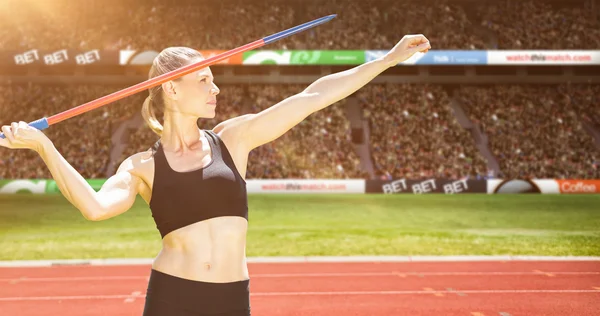 Sportswoman practising javelin throw — Stock Photo, Image