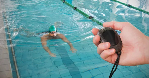 Coach holding stopwatch — Stock Photo, Image