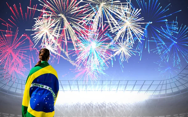 Woman holding Brazilian flag — Stock Photo, Image