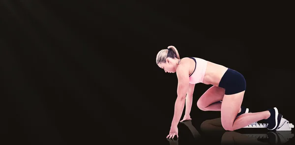 Female athlete on start line — Stock Photo, Image