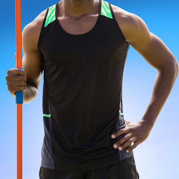 Athletic man holding javelin — Stock Photo, Image