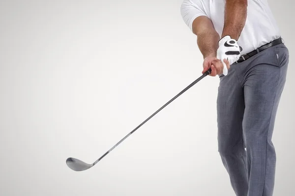 Golf player taking shot — Stock Photo, Image