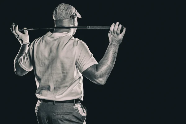 Jogador de golfe segurando clube de golfe — Fotografia de Stock