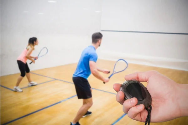 Coach holding stopwatch — Stock Photo, Image