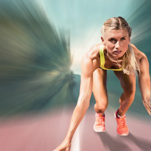 Sportswoman starting to sprint — Stock Photo, Image