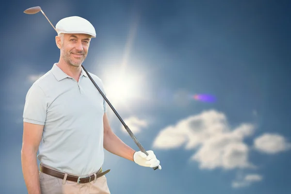 Man met golfclub — Stockfoto