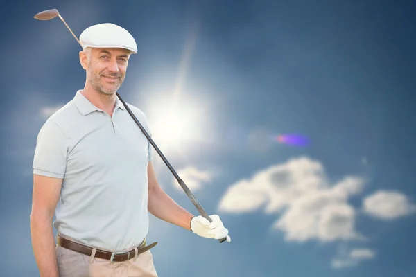 Mann mit Golfschläger — Stockfoto