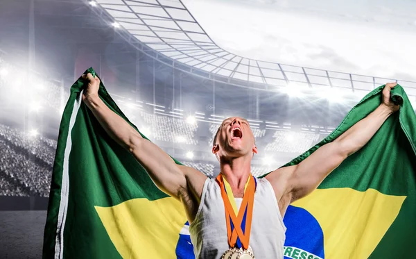Atleter poserer med guldmedaljer efter sejr - Stock-foto