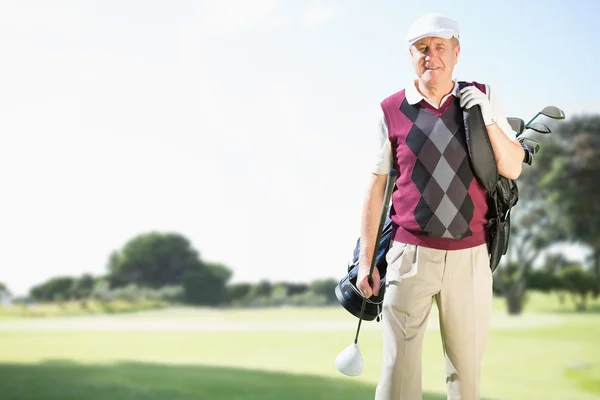 Uomo con attrezzatura da golf — Foto Stock