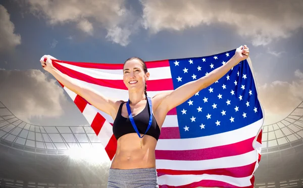 女运动员与美国国旗合影 — 图库照片