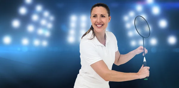 Female player playing badminton — Stock Photo, Image