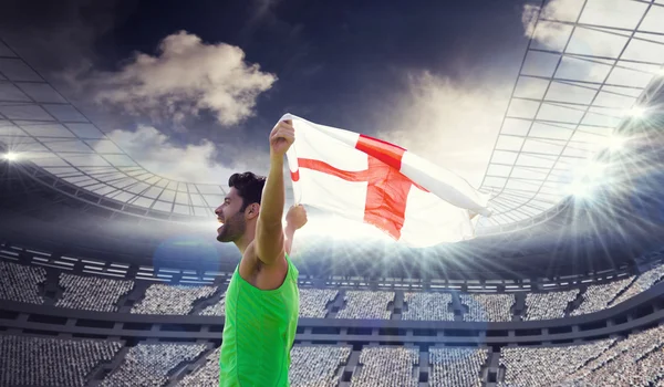 Desportista segurando bandeira da Inglaterra — Fotografia de Stock