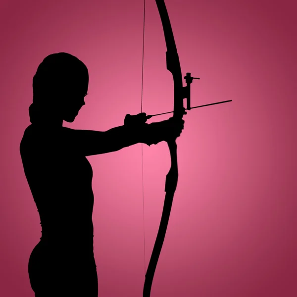 Woman practicing archery — Stock Photo, Image