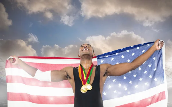 Atleta con medallas de oro y bandera americana —  Fotos de Stock