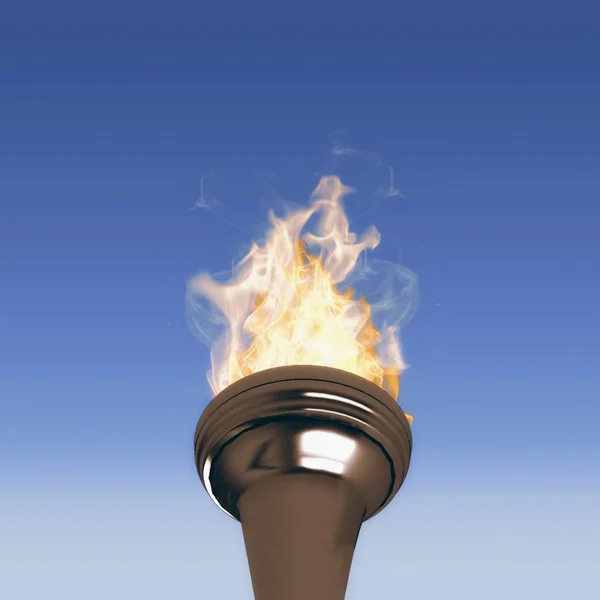 Olympic fire against blue sky — Stock Photo, Image