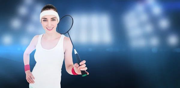 Atleta feminina jogando badminton — Fotografia de Stock