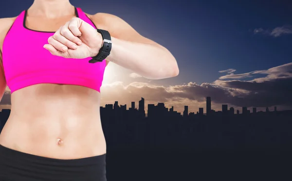 Athlete watching smart watch — Stock Photo, Image