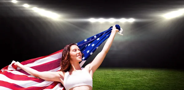 Sportlerin posiert mit amerikanischer Flagge — Stockfoto