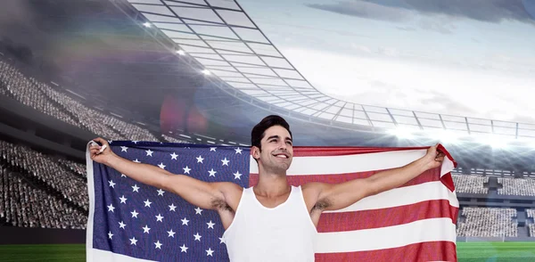 Atleta posando con bandera americana —  Fotos de Stock