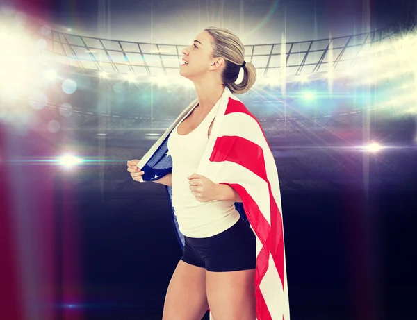 Athlete with american flag on shoulders — Stock Photo, Image