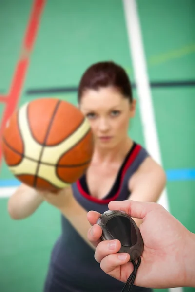 Coach holding stopwatch — Stock Photo, Image