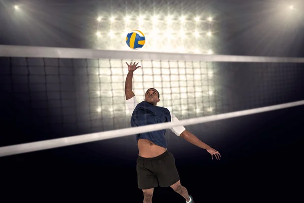 Zusammengesetztes Bild eines Sportlers, der Volleyball spielt — Stockfoto