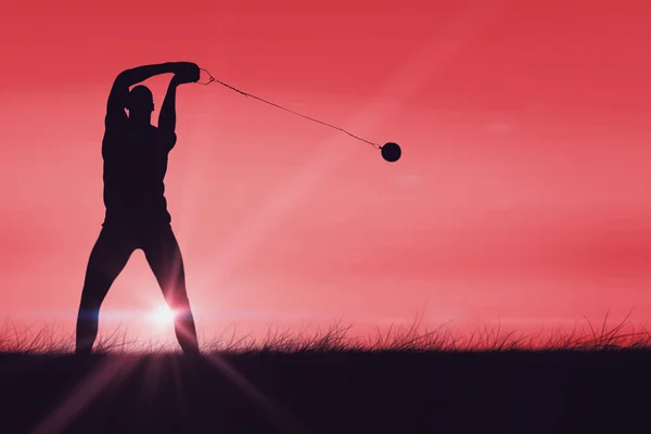 Sportsman practising hammer throw — Stock Photo, Image