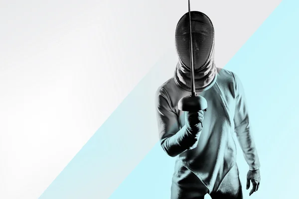 Man wearing fencing suit practicing with sword — Stock Photo, Image