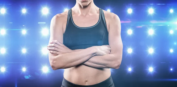 Athlete posing with arms crossed — Stock Photo, Image