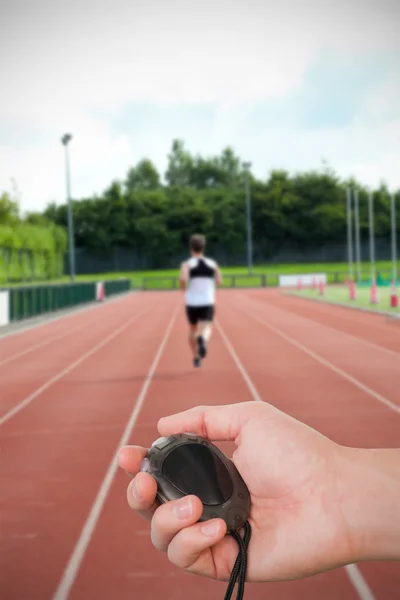 Coach is holding stopwatch — Stock Photo, Image