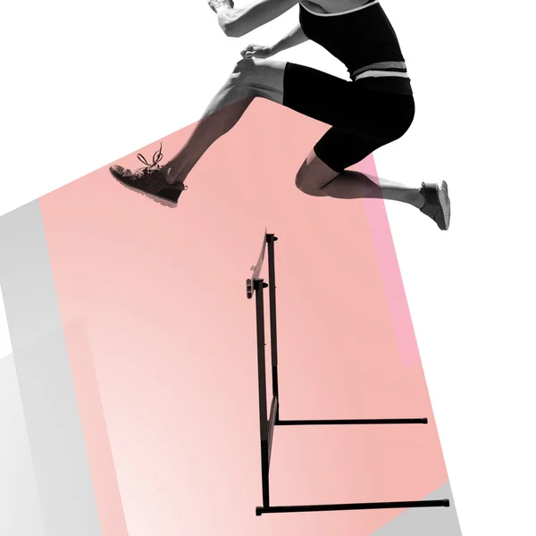 Woman practicing hurdles — Stock Photo, Image