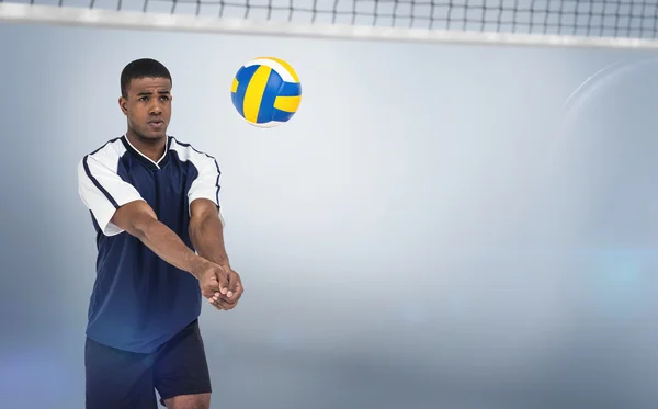 Sammansatt bild av sportsman spelar volleyboll — Stockfoto