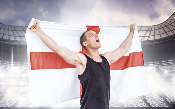 Idrottsman håller england flagga — Stockfoto