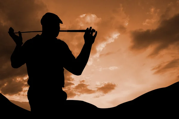 Golf player holding golf club — Stock Photo, Image