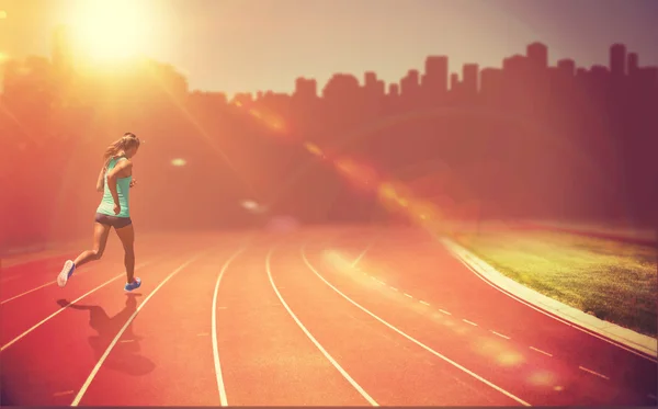 Zadní pohled sportovkyně běží — Stock fotografie