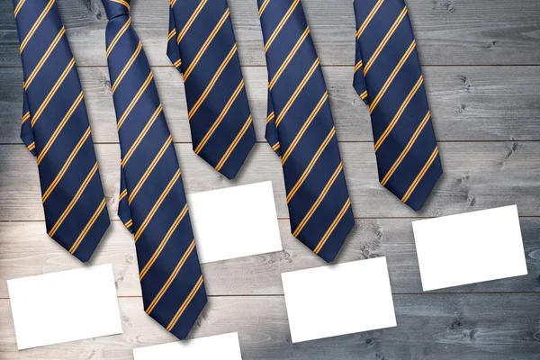 Blue ties against white cards — Stock Photo, Image