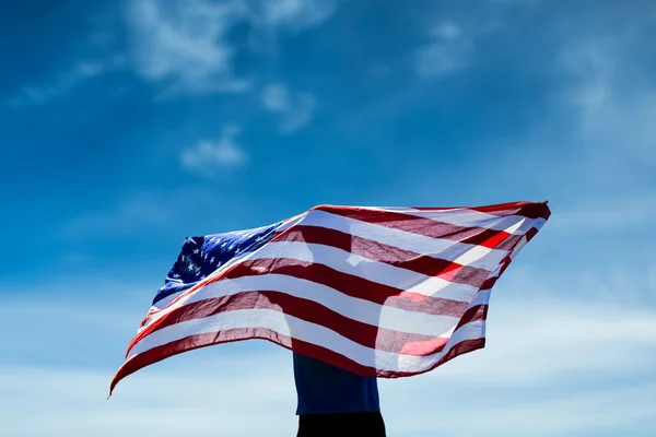 Sportowca pozowanie z amerykańską flagą — Zdjęcie stockowe