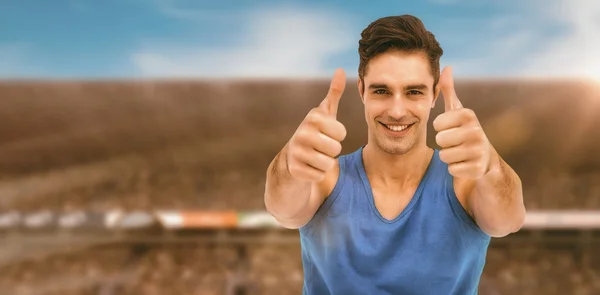 Imagen compuesta de atleta masculino posando —  Fotos de Stock