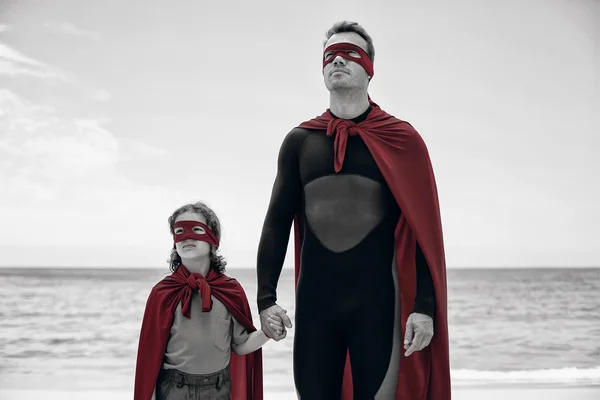 Father and son in superhero costume — Stock Photo, Image