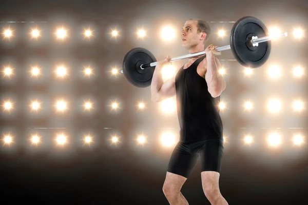 Bodybuilder lyfta tung skivstång vikter — Stockfoto