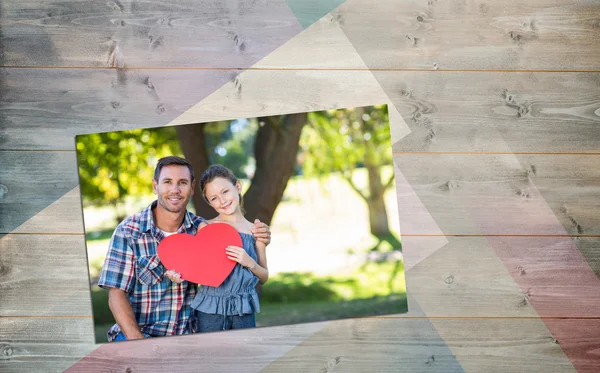 Father and daughter smiling in the park — Stock Photo, Image