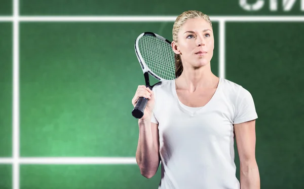 Tennis player posing with racket — Stock Photo, Image