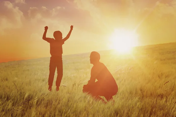 Smiling boy jumping — Stock Photo, Image