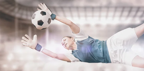 Woman goalkeeper stopping a goal — Stock Photo, Image