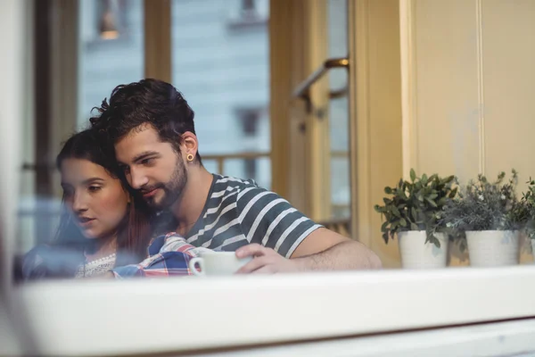 Young couple bonding at cafe — Stock Photo, Image