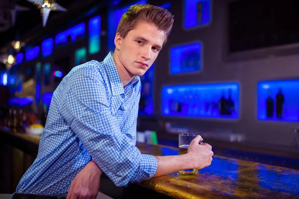 man at bar counter