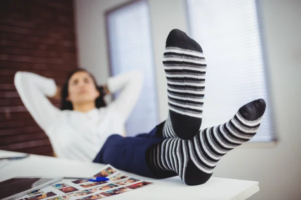 Woman relaxing in office — Stock Photo, Image