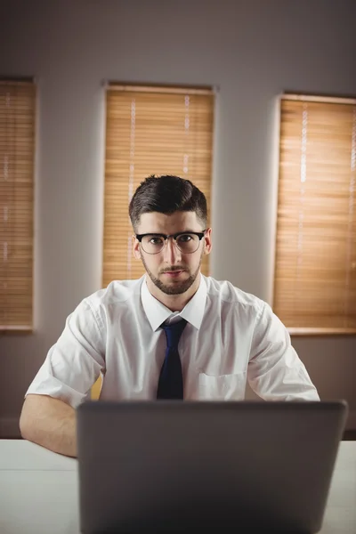Man sitting in office — Stock Photo, Image